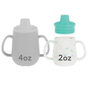 image:imageNuby First Training Cup  Silicone Cup with FreeFlow Spout and EasyGrip Design  2 oz  6 Months  Purple and PinkAqua  Sprinkles