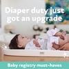 image:imageNuby Diaper Changing Pad with Safety Harness for Infants  NonSlip Base Contoured Sides Soft Foam and Waterproof Surface